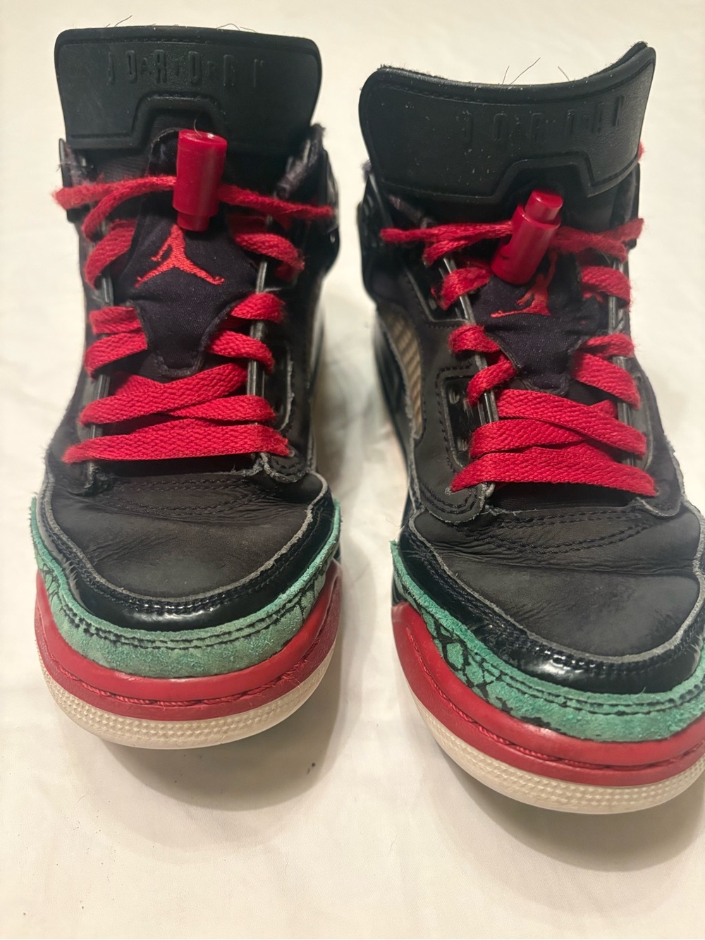 Jordan Kids Black Sneakers with Red Accents